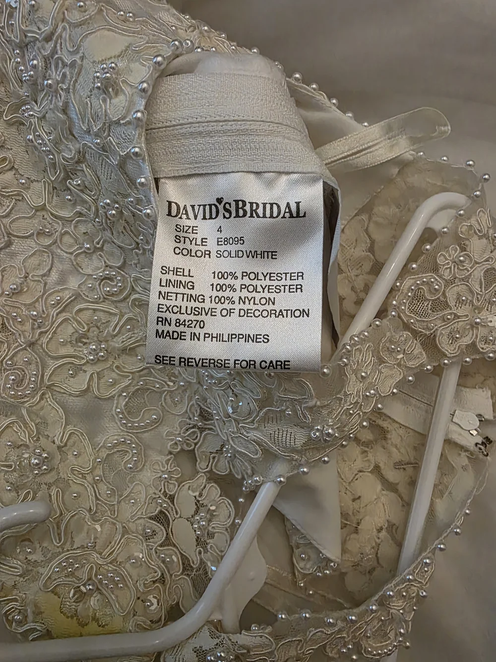 David's Bridal Ivory Beaded A-Line Flower Girl Dress with Bow - Picture 3 of 5